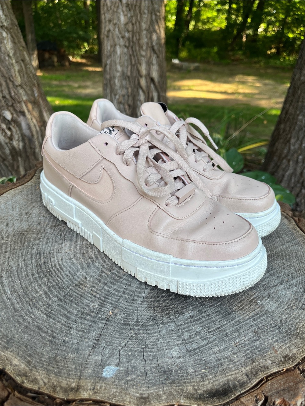 Nike Women’s Light Pink Leather Platform Sneakers